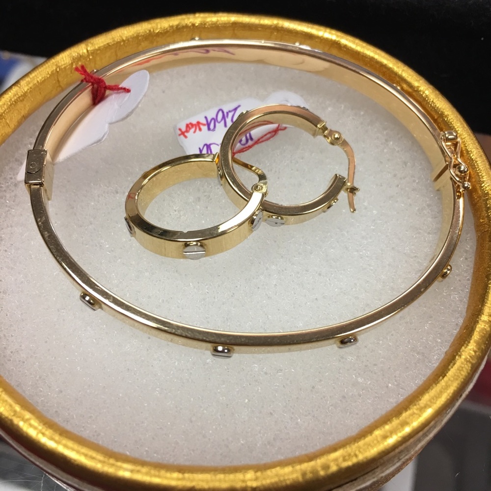 Bracelet and earrings Cartier